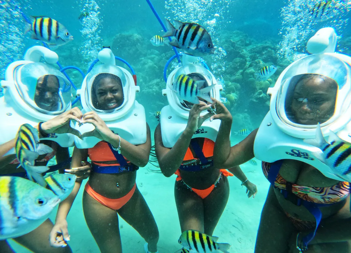 A certified diver over a coral reef on a two-tank scuba diving trip in St. Thomas